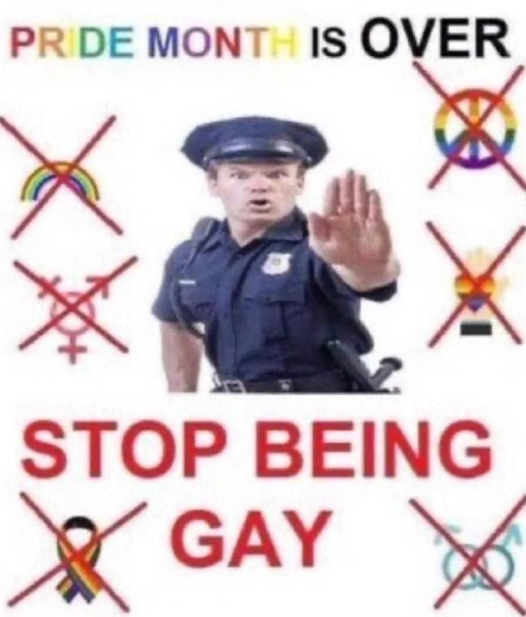 a police officer is holding up a sign